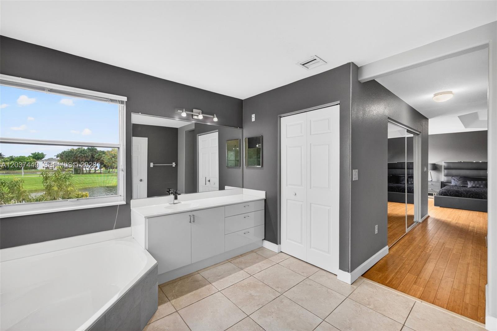 17488 Southwest 28th Court Miramar, FL 33029 - Photo 25 of 50 a large white kitchen with a large window