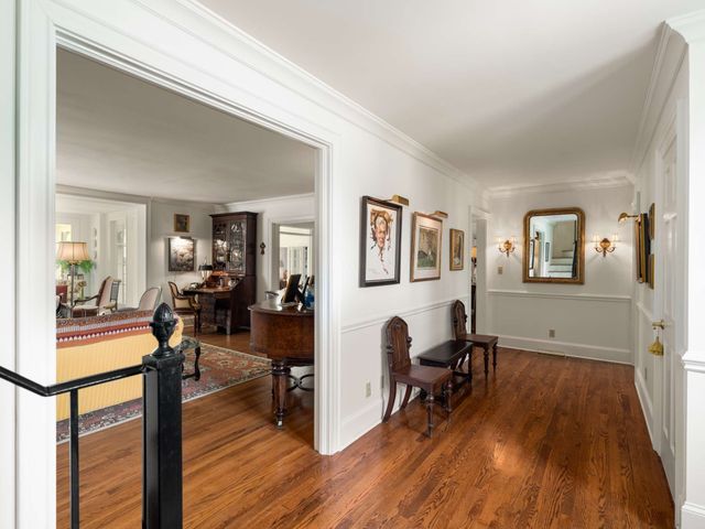 a living room with fireplace furniture and a flat screen tv