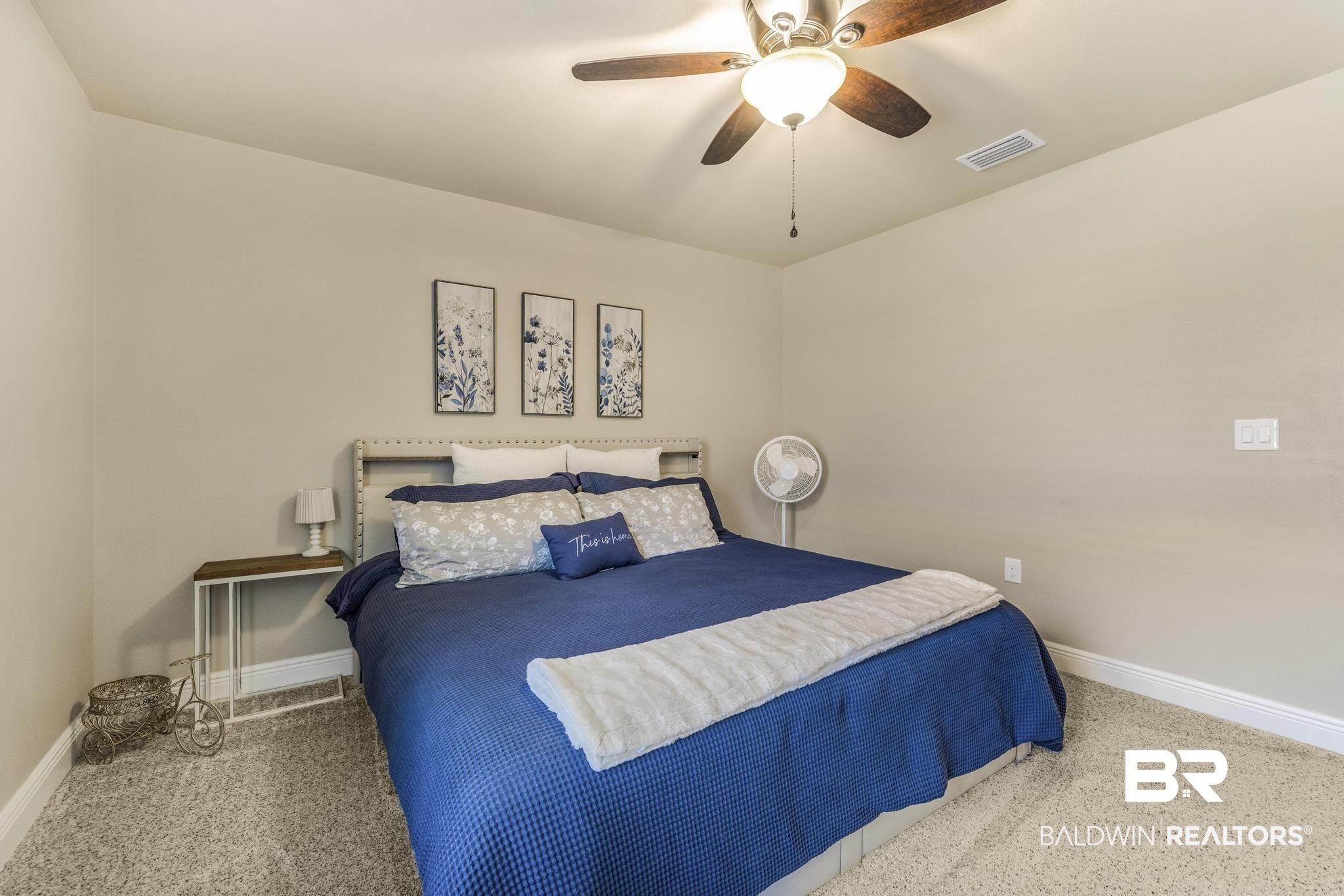 22043 Garland Loop Silverhill, AL 36576 - Photo 26 of 41 Carpeted bedroom featuring baseboards and a ceiling fan