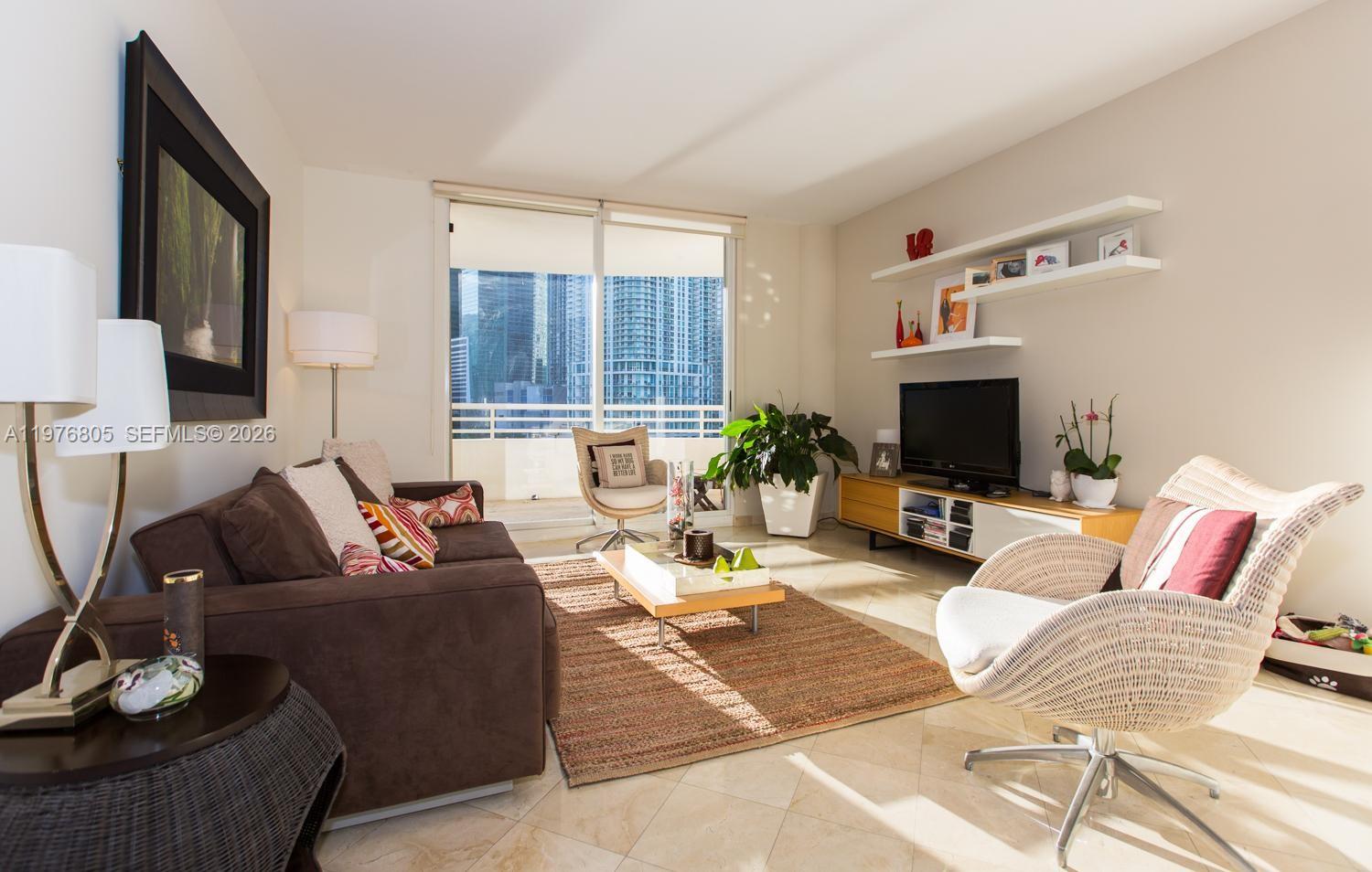 888 Brickell Key Drive, Unit 804 Miami, FL 33131 - Photo 7 of 16 exit to balcony