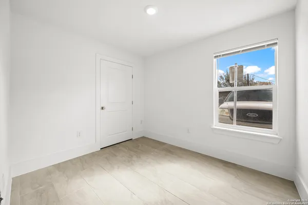 an empty room with window