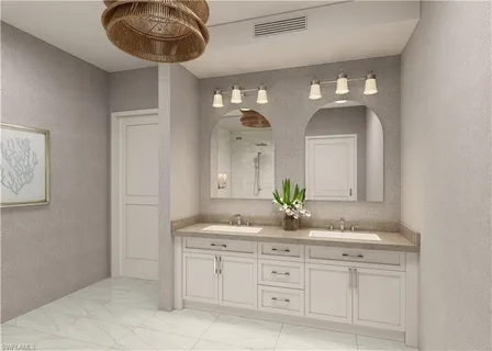 a bathroom with a double vanity sink and a mirror