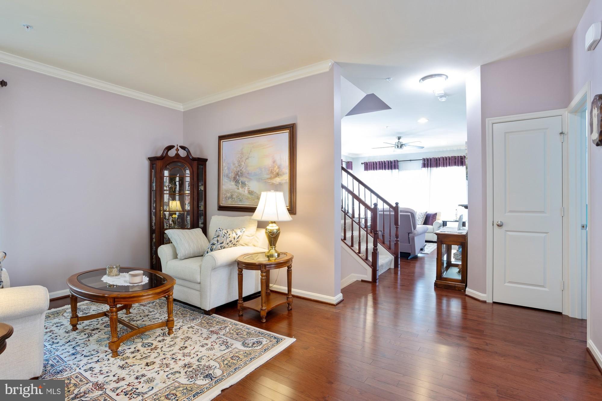 1712 Renaissance Drive Baltimore, MD 21221 - Photo 6 of 73 Living Room with Cherry Hardwood Floors