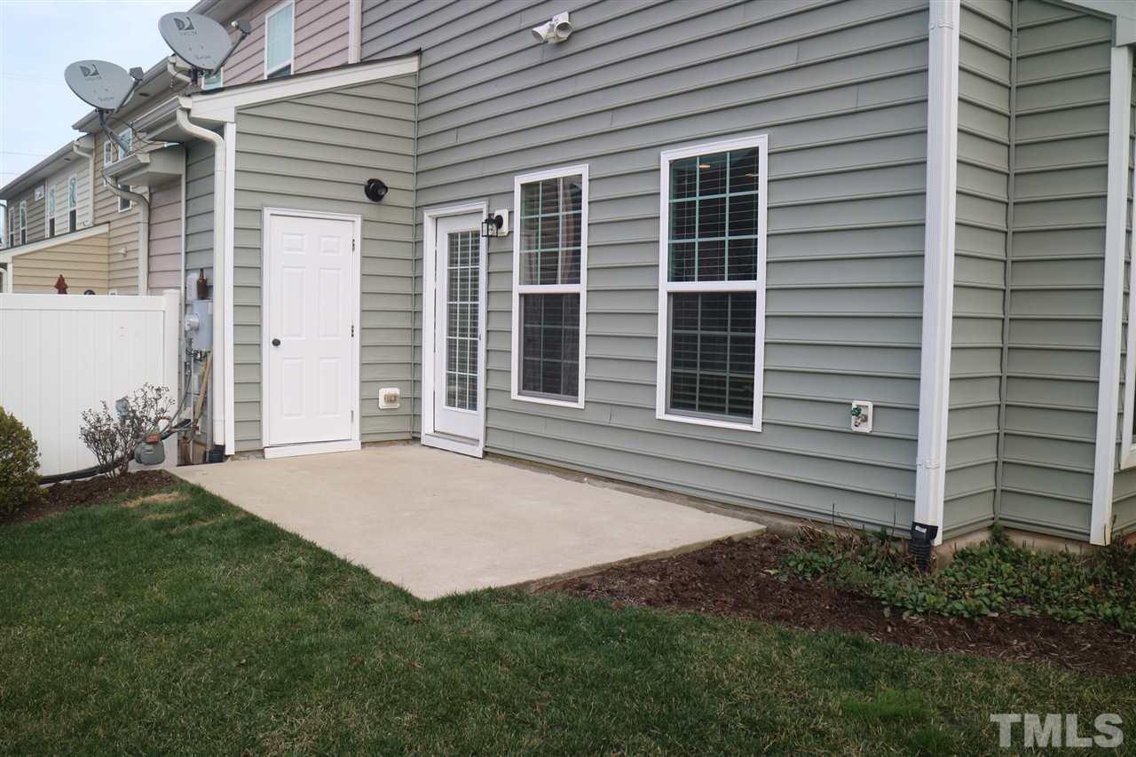408 Provincial Street Raleigh, NC 27603 - Photo 2 of 24 a front view of a house with a yard