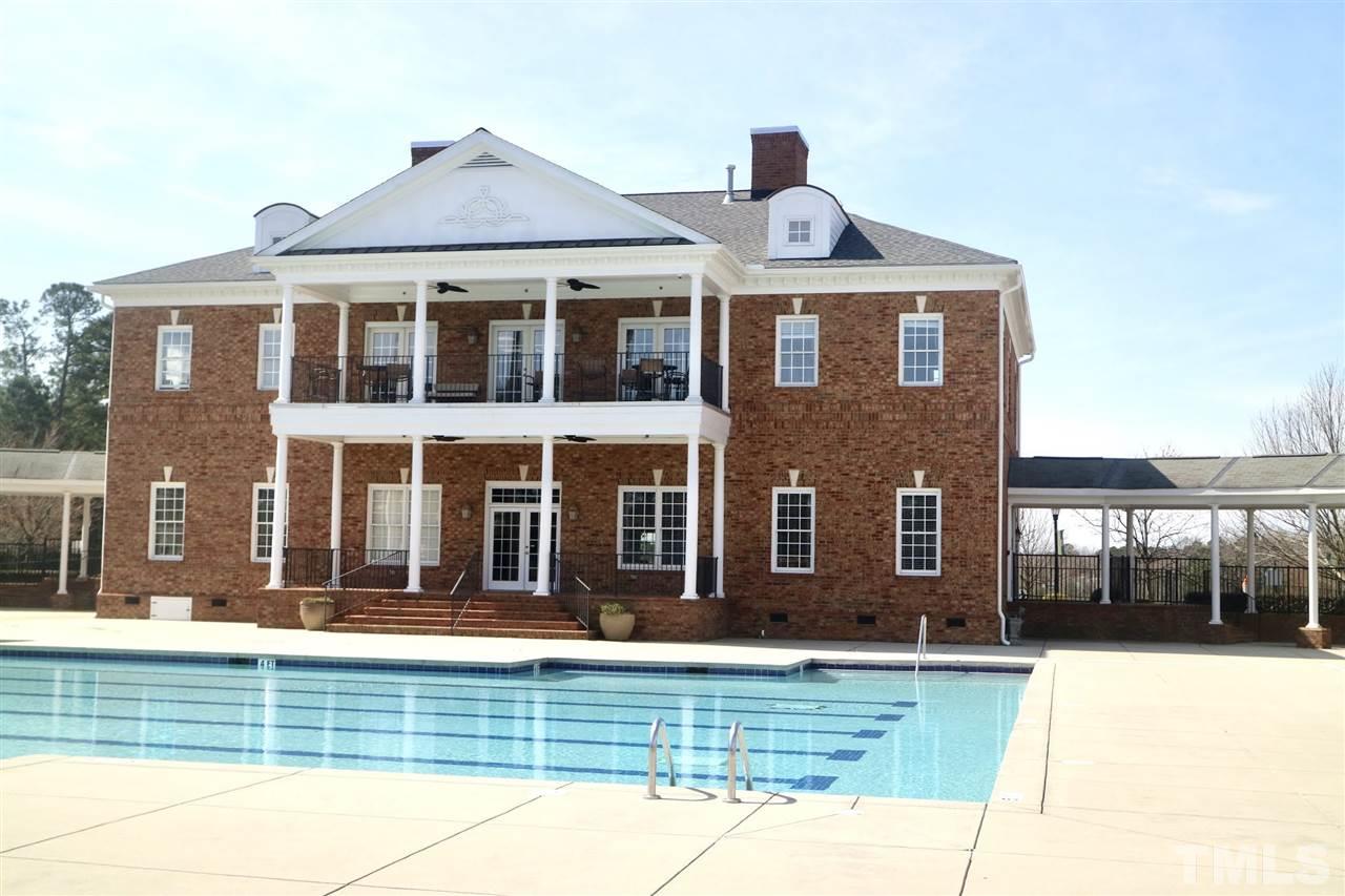 408 Provincial Street Raleigh, NC 27603 - Photo 16 of 24 a front view of a house with swimming pool