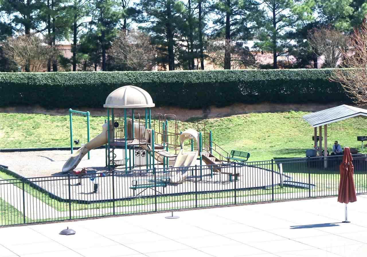 408 Provincial Street Raleigh, NC 27603 - Photo 21 of 24 a view of a swimming pool with a patio