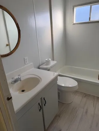 a bathroom with a sink and a toilet