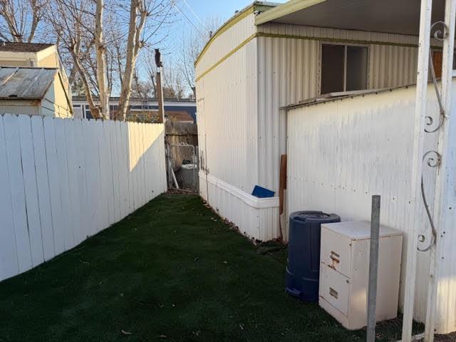 16073 Totem Drive Isleton, CA 95641 - Photo 24 of 25 a backyard of a house with lots of green space