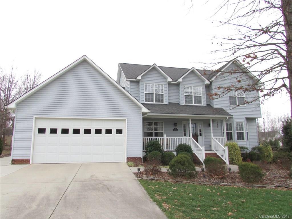 511 Maple Ridge Circle Salisbury, NC 28147 - Photo 1 of 24 a view of white house with a yard and large trees