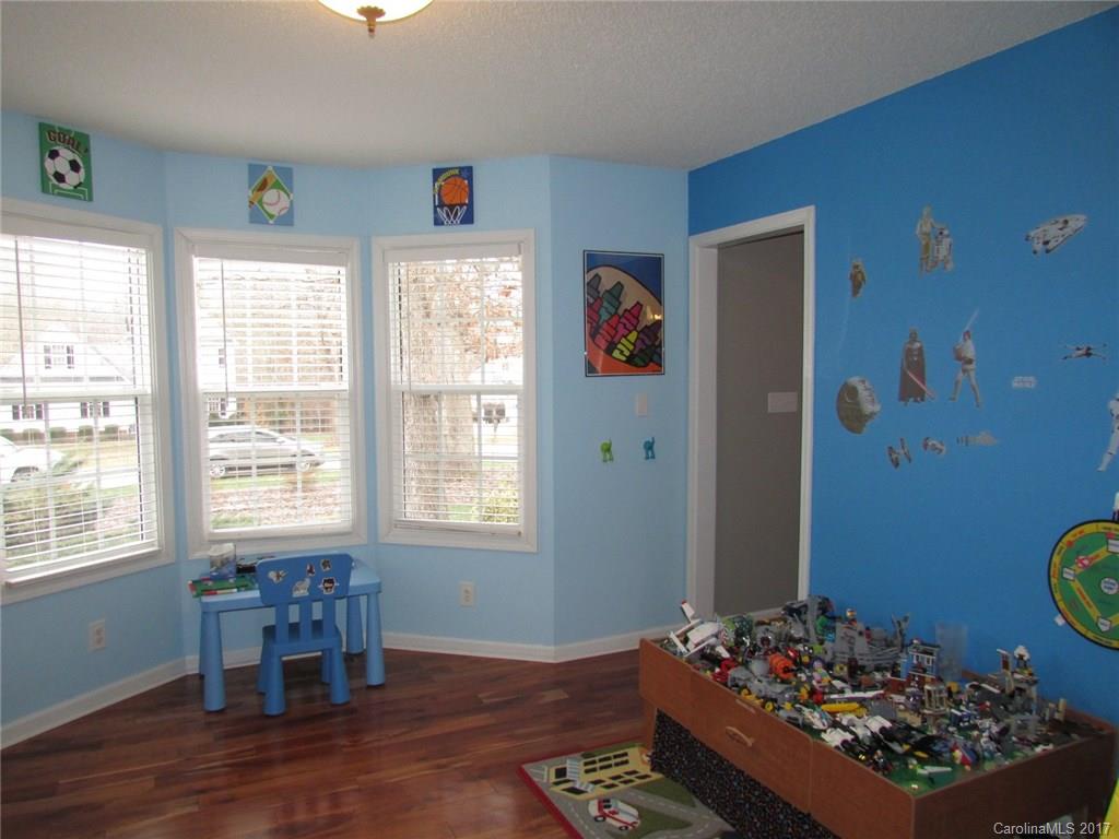 511 Maple Ridge Circle Salisbury, NC 28147 - Photo 10 of 24 a bed room with a bed and a window