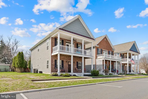front view of a building with a yard