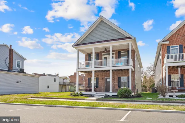 a view of outdoor space with deck and furniture
