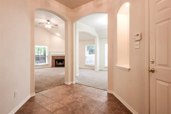 wooden floor with a bathroom