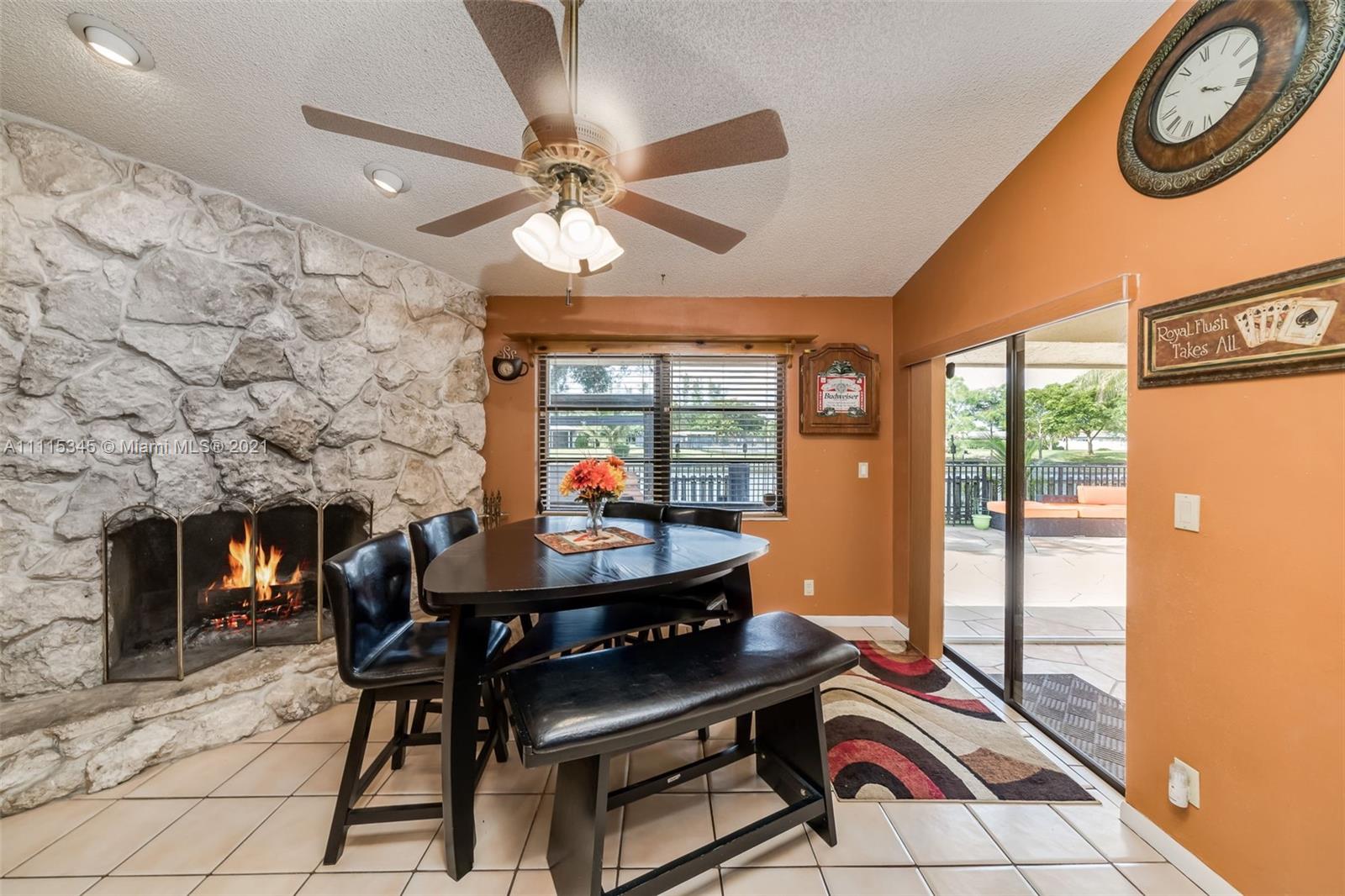 7921 Northwest 90th Avenue Tamarac, FL 33321 - Photo 19 of 69 a dining room with furniture and window