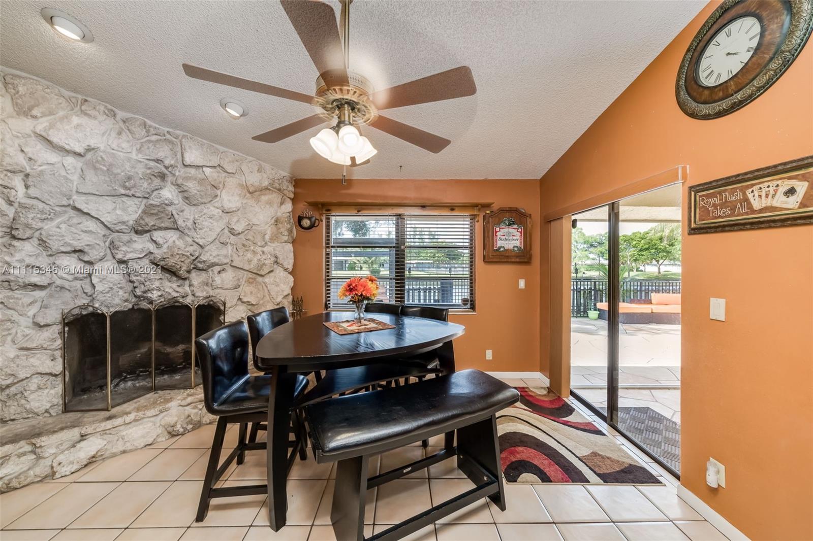 7921 Northwest 90th Avenue Tamarac, FL 33321 - Photo 20 of 69 a dining room with furniture and window