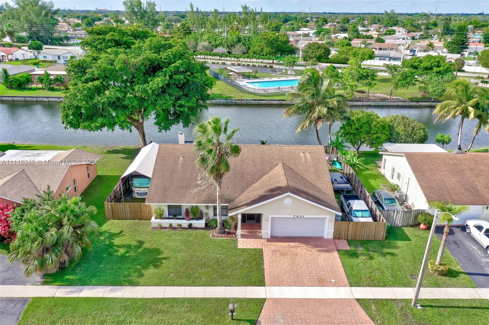 7921 Northwest 90th Avenue Tamarac, FL 33321 - Photo 58 of 69 an aerial view of a house with a garden