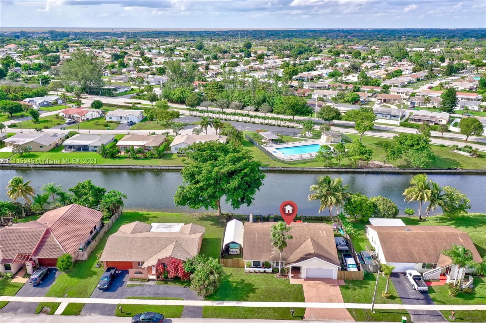 7921 Northwest 90th Avenue Tamarac, FL 33321 - Photo 61 of 69 an aerial view of a city