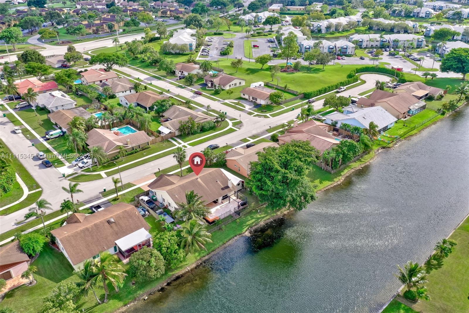 7921 Northwest 90th Avenue Tamarac, FL 33321 - Photo 65 of 69 an aerial view of residential houses with outdoor space and street view