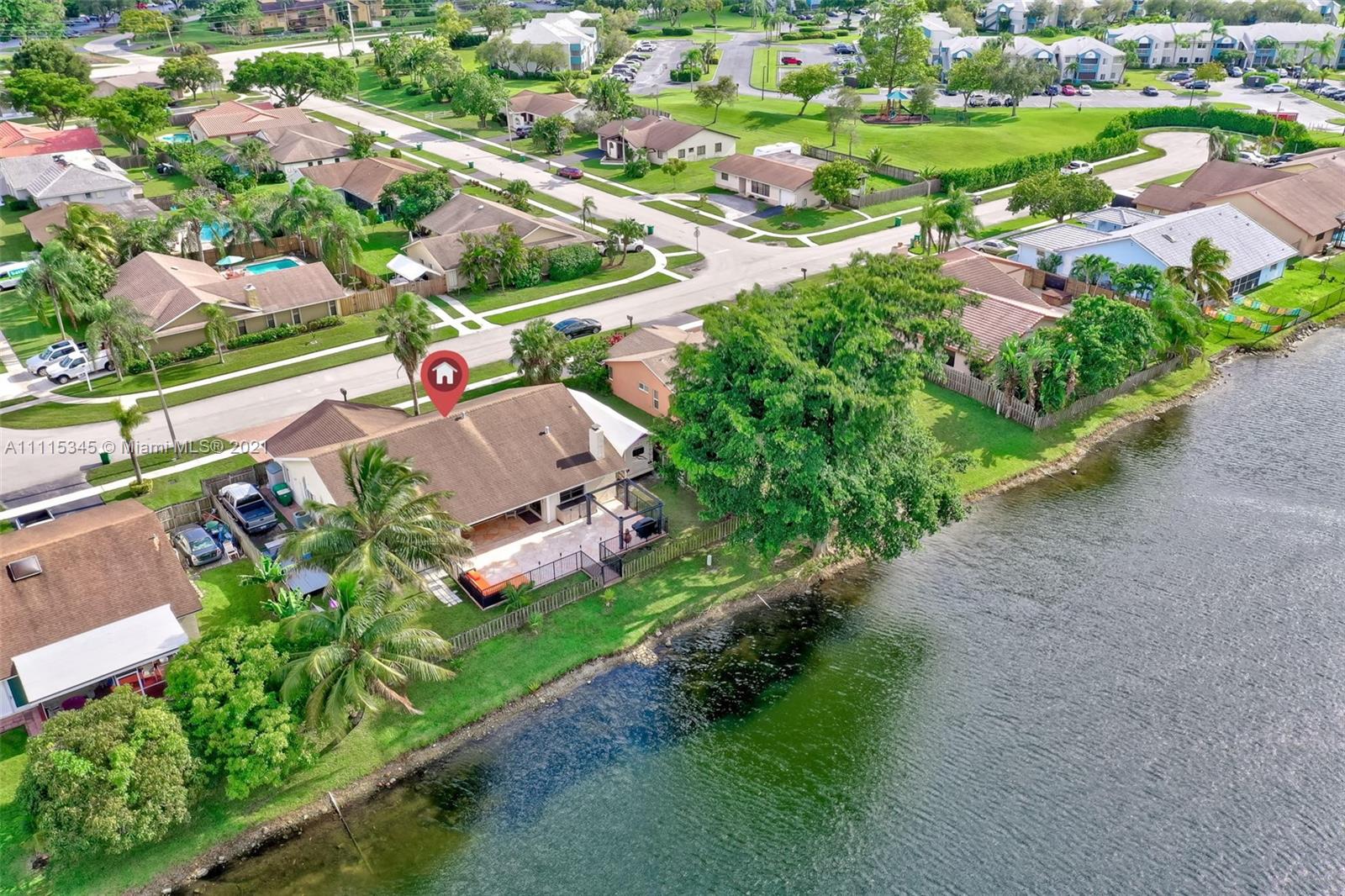 7921 Northwest 90th Avenue Tamarac, FL 33321 - Photo 66 of 69 an aerial view of residential houses with outdoor space and street view
