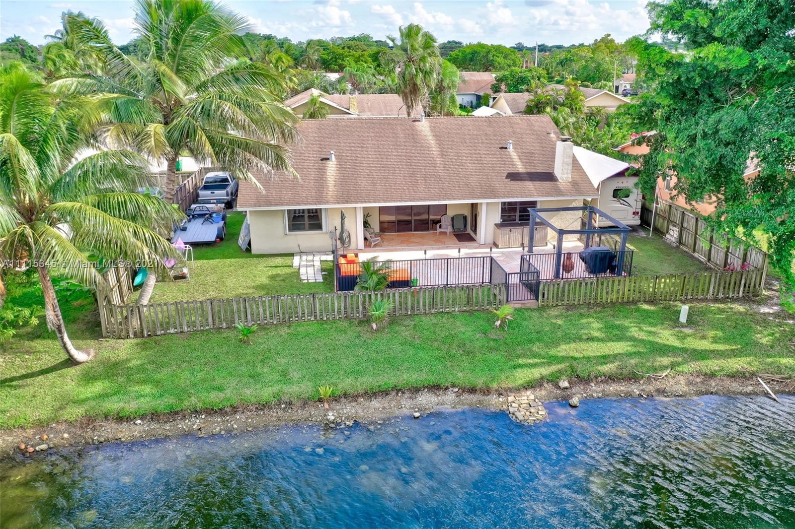 7921 Northwest 90th Avenue Tamarac, FL 33321 - Photo 68 of 69 a view of house with backyard