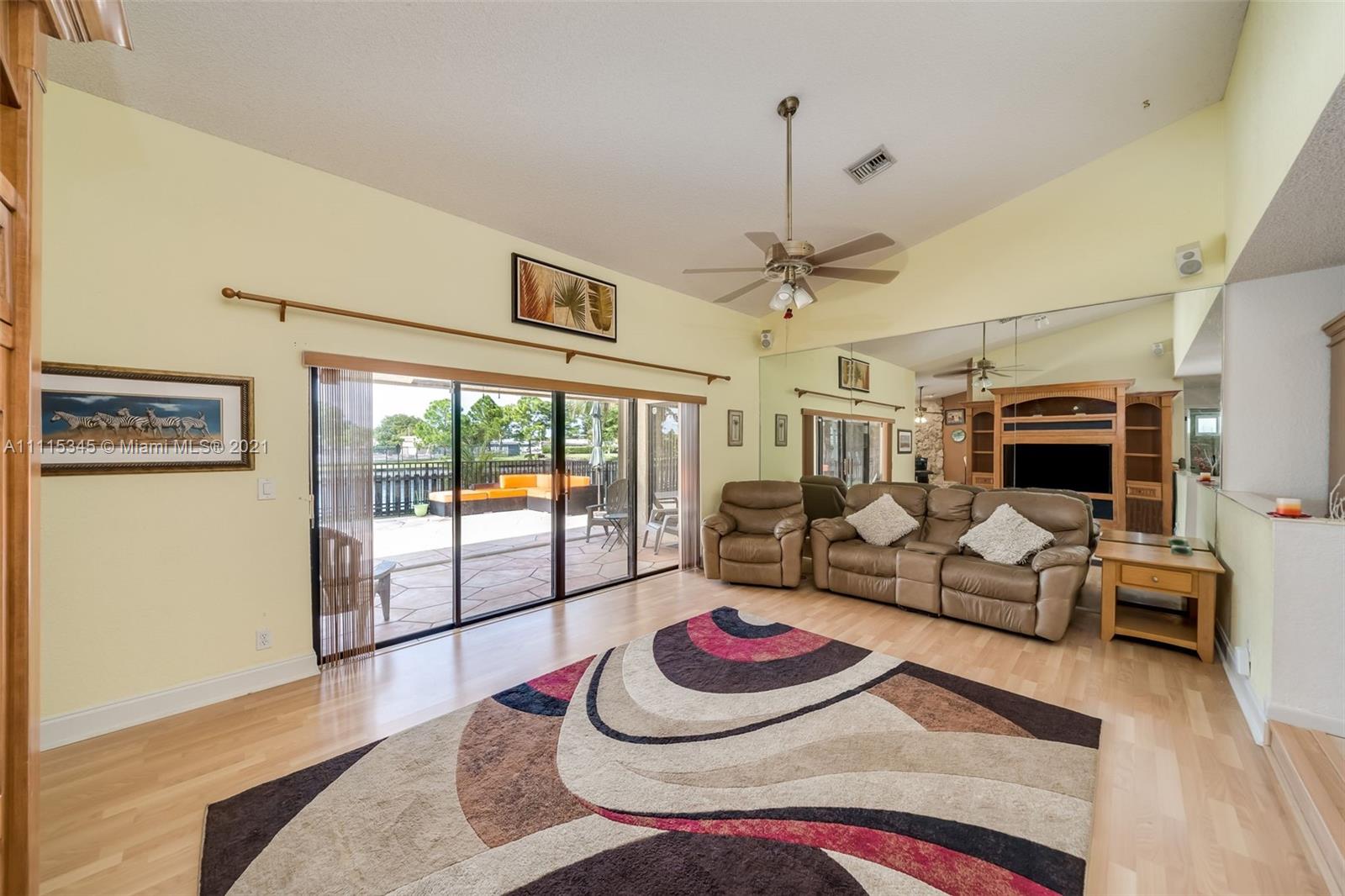 7921 Northwest 90th Avenue Tamarac, FL 33321 - Photo 10 of 69 a living room with furniture and a large window