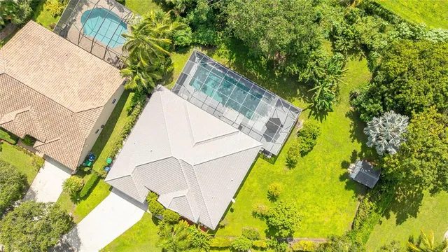 a view of swimming pool with a garden