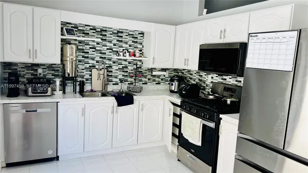 $875,000 | 18901 Northwest 77th Court, Hialeah, FL 33015