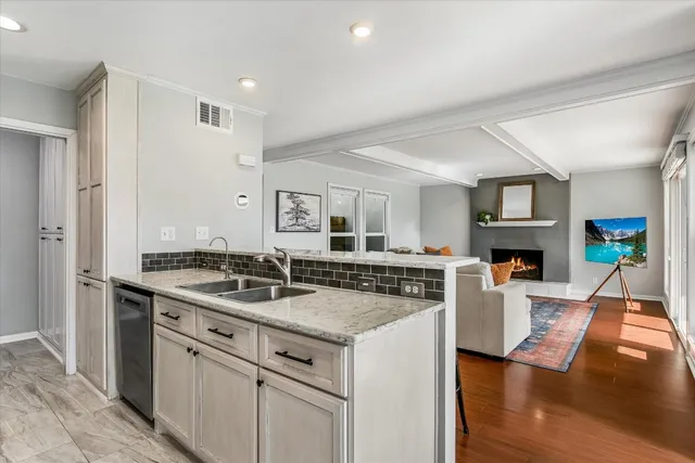 a view of a swimming pool with lounge chairs