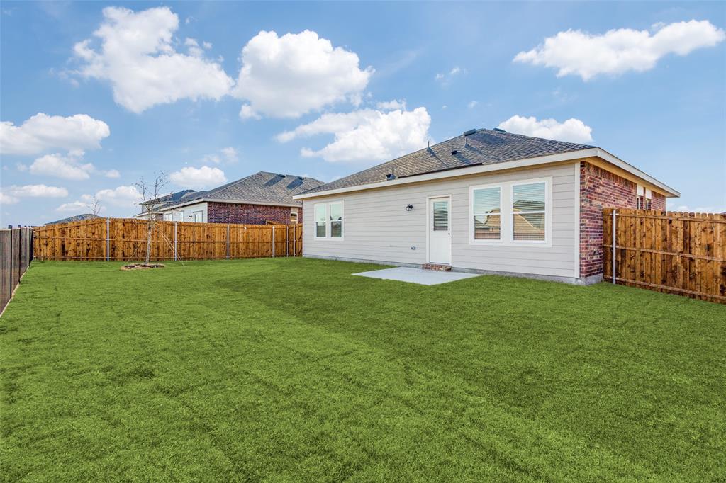 1816 Wolf Run Anna, TX 75409 - Photo 11 of 11 a view of an house with backyard space and garden