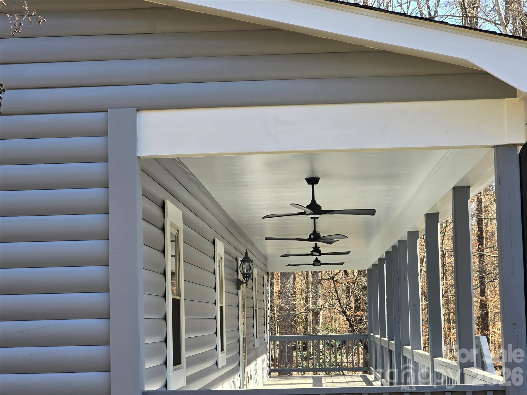 6802 Lowesville Lane Stanley, NC 28164 - Photo 7 of 25 a view of a livingroom with a ceiling fan and window