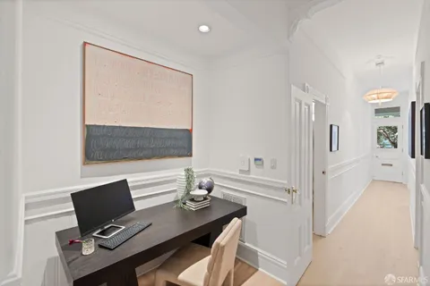 a view of a chairs on the roof deck