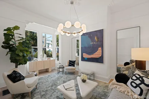 a kitchen with a sink and a potted plant