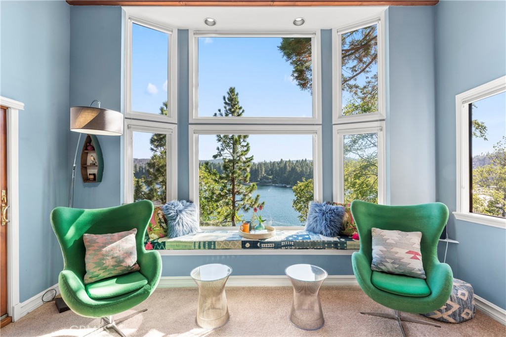 28019 North Shore Road Lake Arrowhead, CA 92352 - Photo 5 of 30 a living room with furniture and a large window