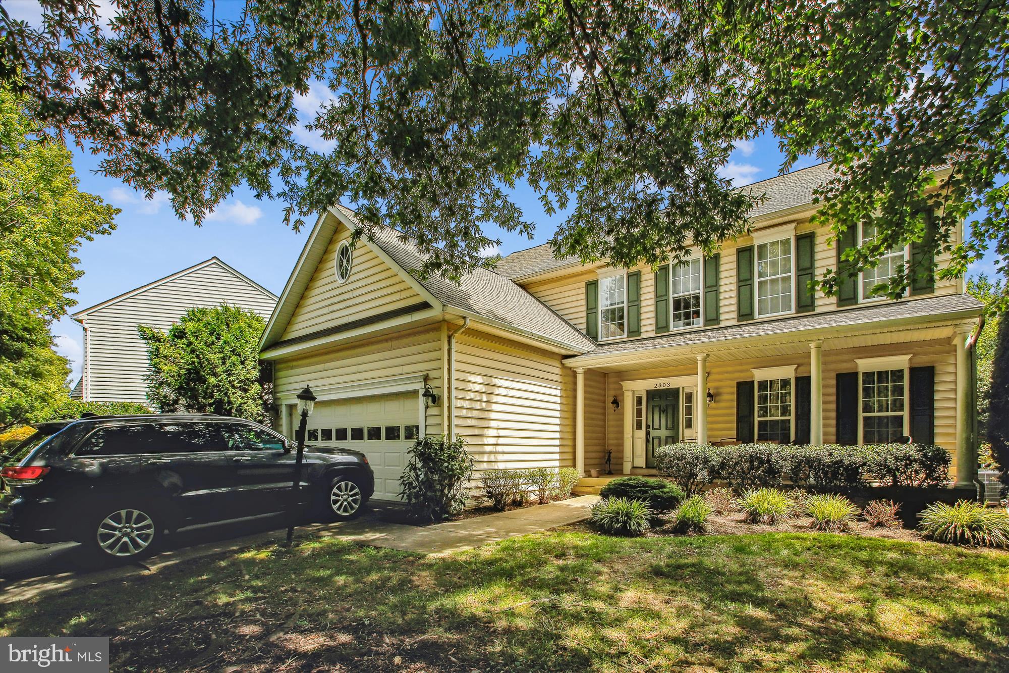 2303 Hurlingham Lane Reston, VA 20191 - Photo 8 of 8 a front view of a house with a yard