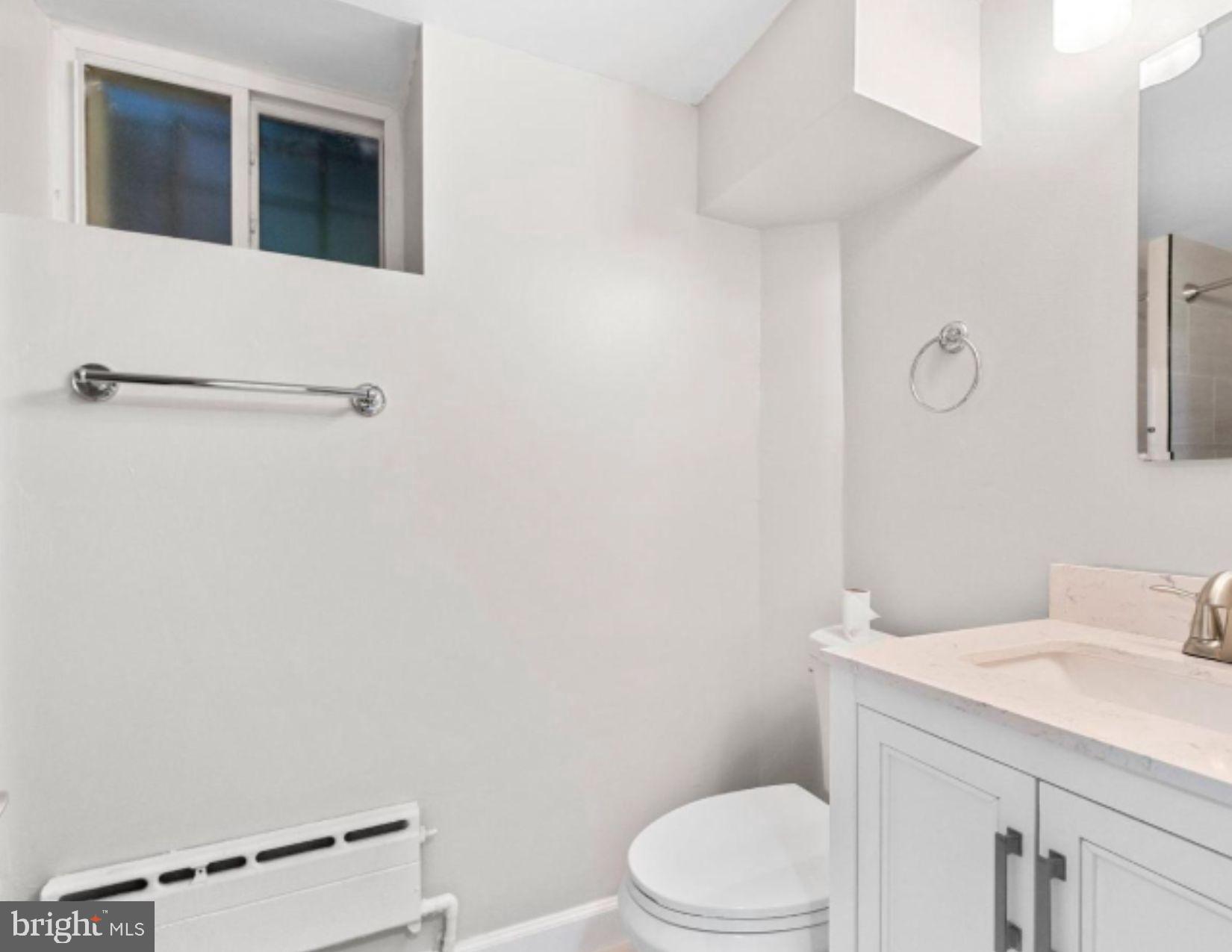 3020 North Calvert Street Baltimore, MD 21218 - Photo 11 of 13 Modern bathroom with sleek finishes.