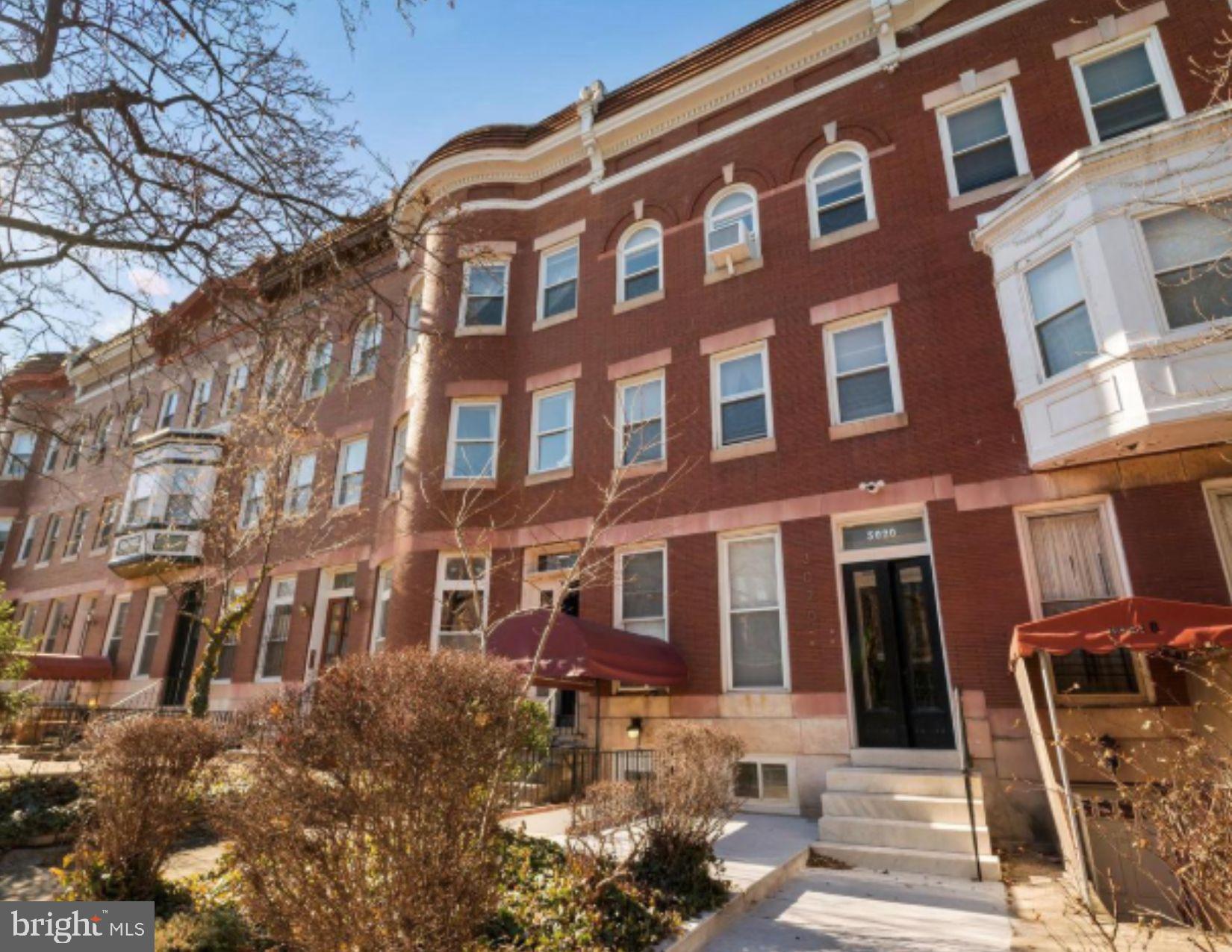3020 North Calvert Street Baltimore, MD 21218 - Photo 2 of 13 Charming brick facade with inviting entryway.