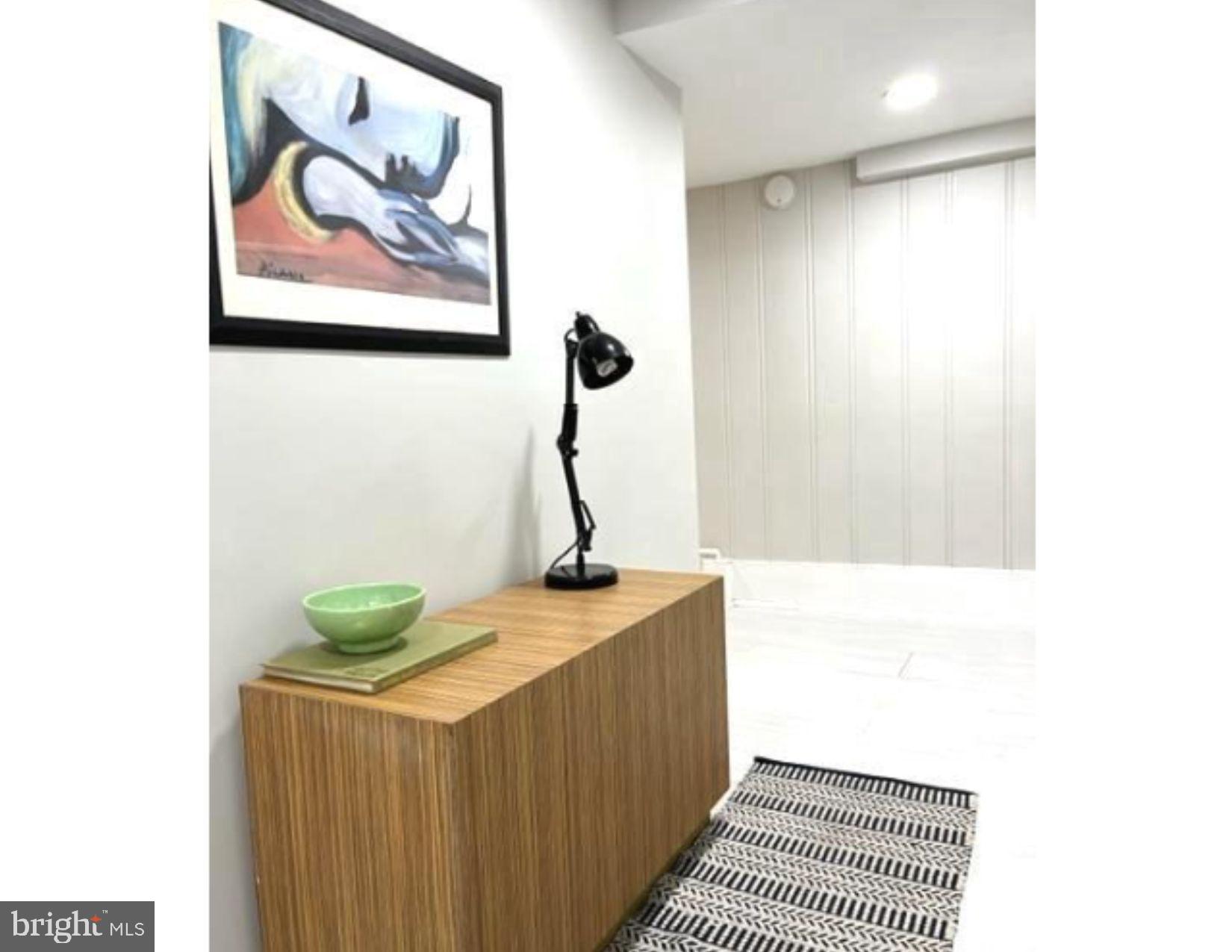 3020 North Calvert Street Baltimore, MD 21218 - Photo 4 of 13 Modern entryway with artistic flair.