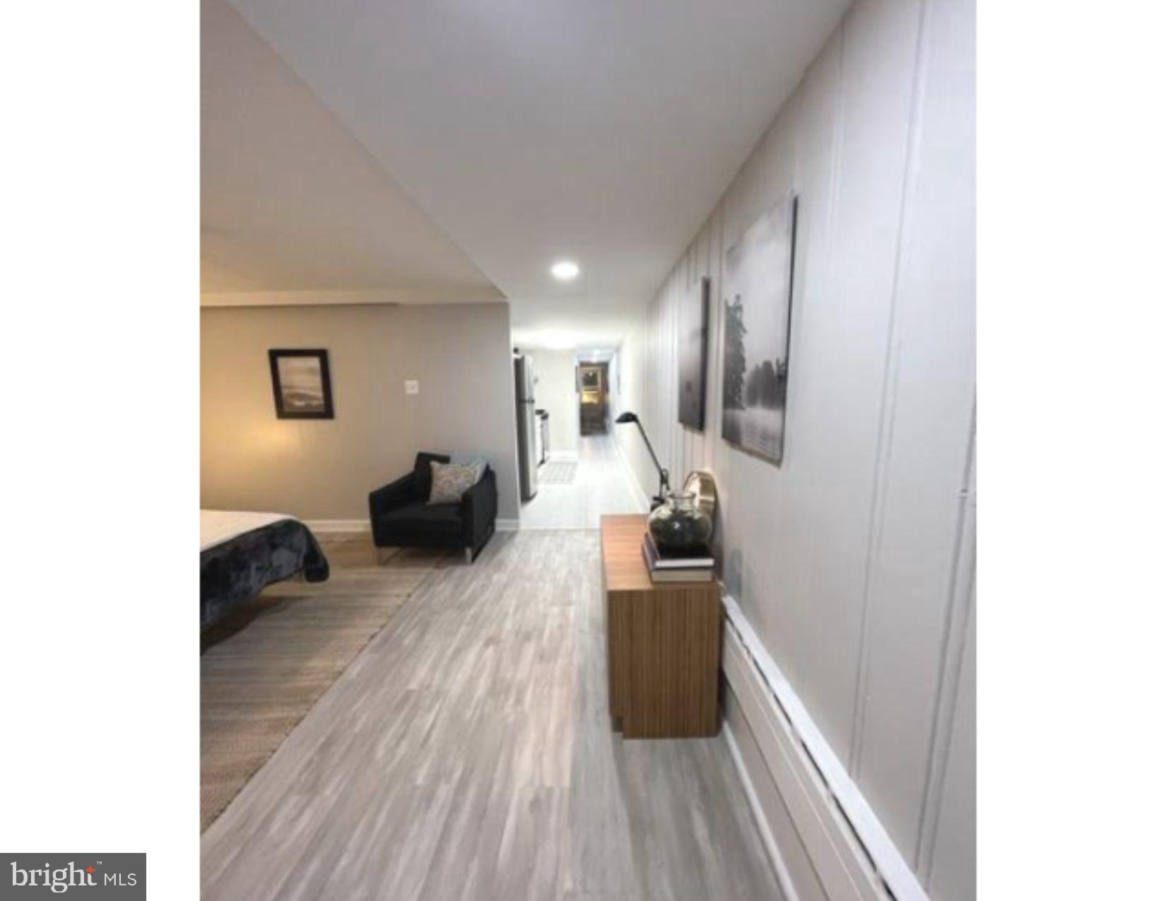 3020 North Calvert Street Baltimore, MD 21218 - Photo 5 of 13 Bedroom or living room with large closets