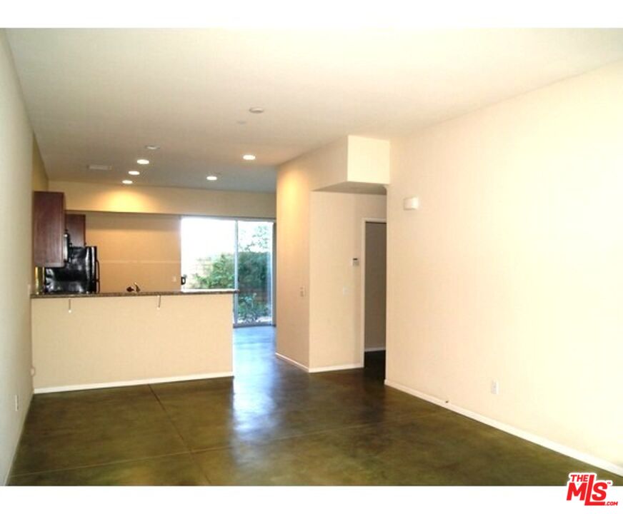 228 Sandy Point Trail Palm Springs, CA 92262 - Photo 11 of 12 a view of kitchen with furniture and wooden floor