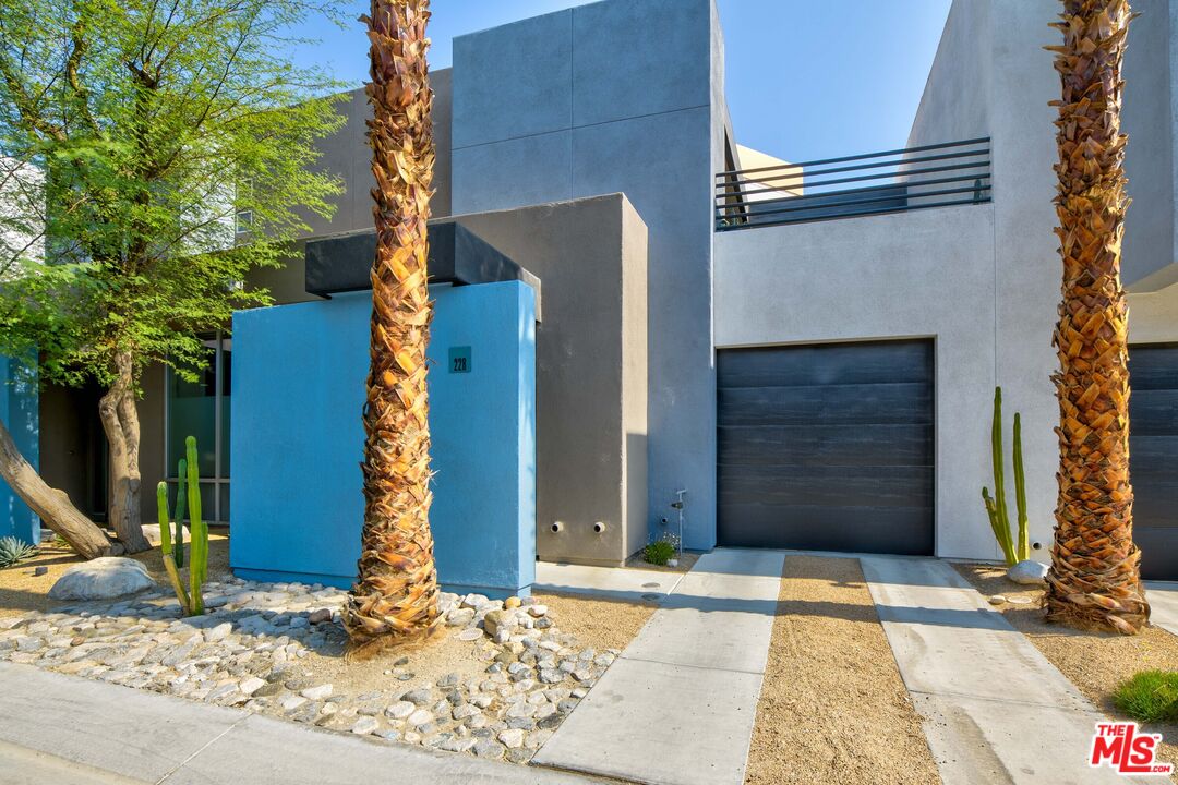 228 Sandy Point Trail Palm Springs, CA 92262 - Photo 2 of 12 a house with a door