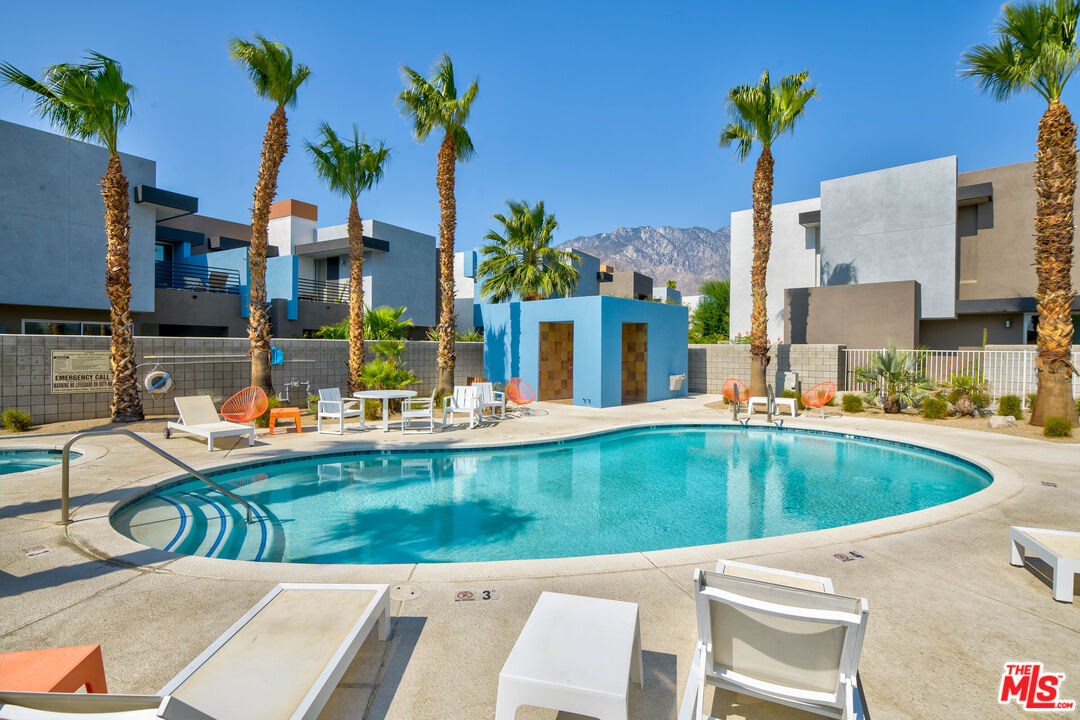 228 Sandy Point Trail Palm Springs, CA 92262 - Photo 4 of 12 a view of swimming pool with outdoor seating