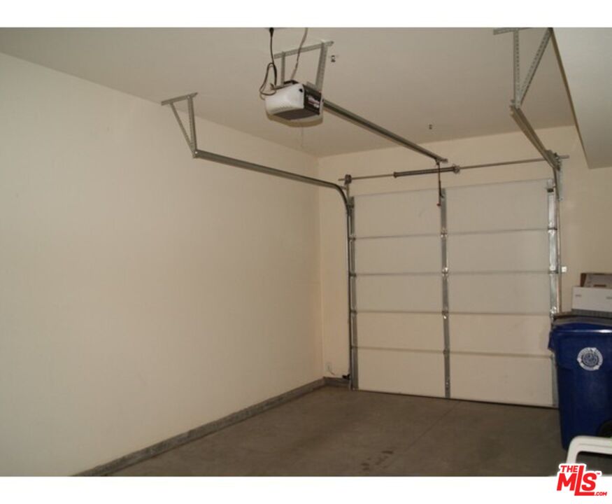 228 Sandy Point Trail Palm Springs, CA 92262 - Photo 8 of 12 a view of a room with racks on the wall