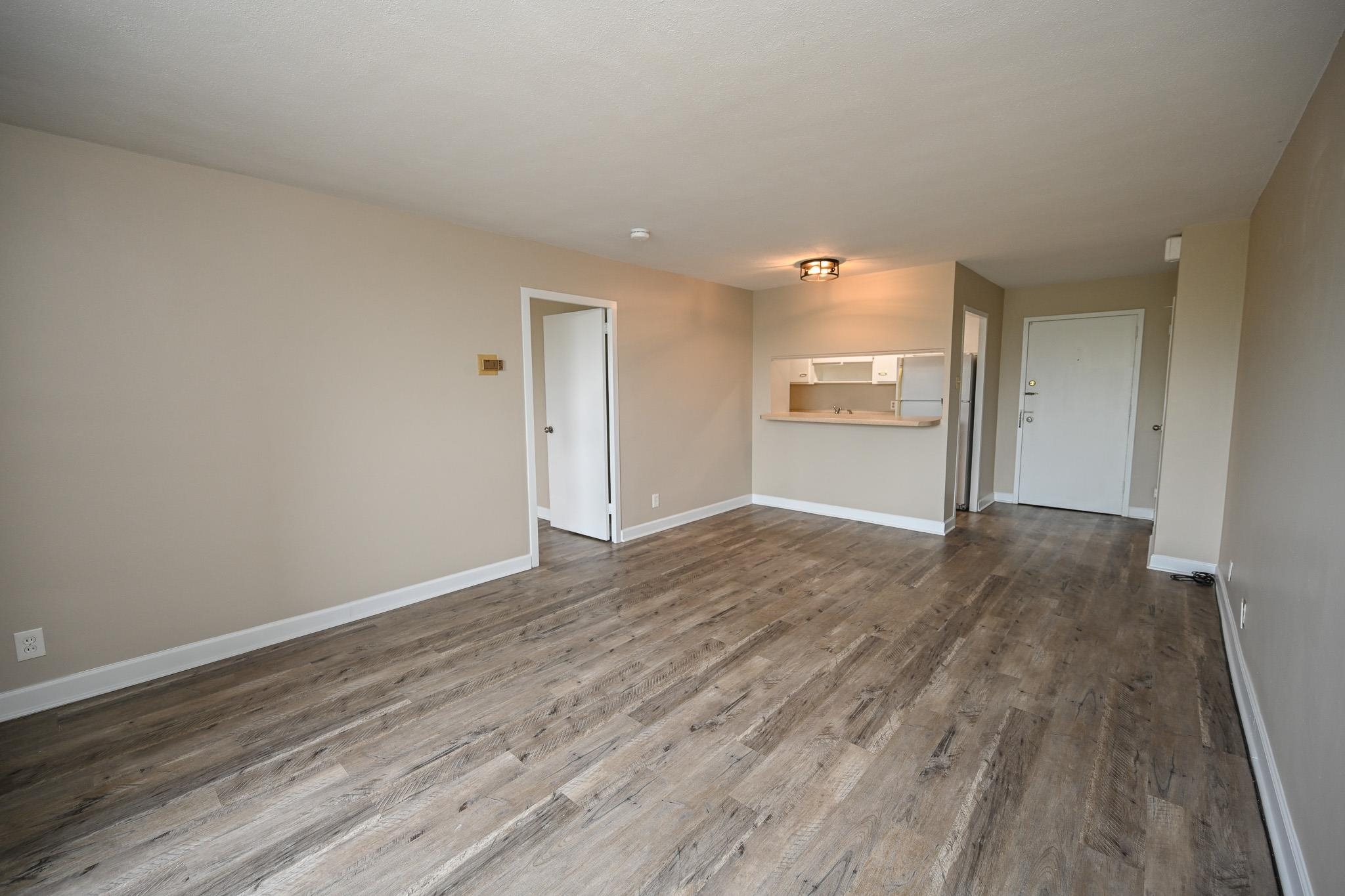 2277 Union Avenue, Unit 408 Memphis, TN 38104 - Photo 3 of 31 a view of an empty room with wooden floor
