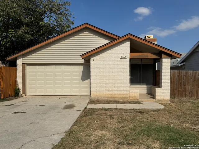 a view of backyard of house