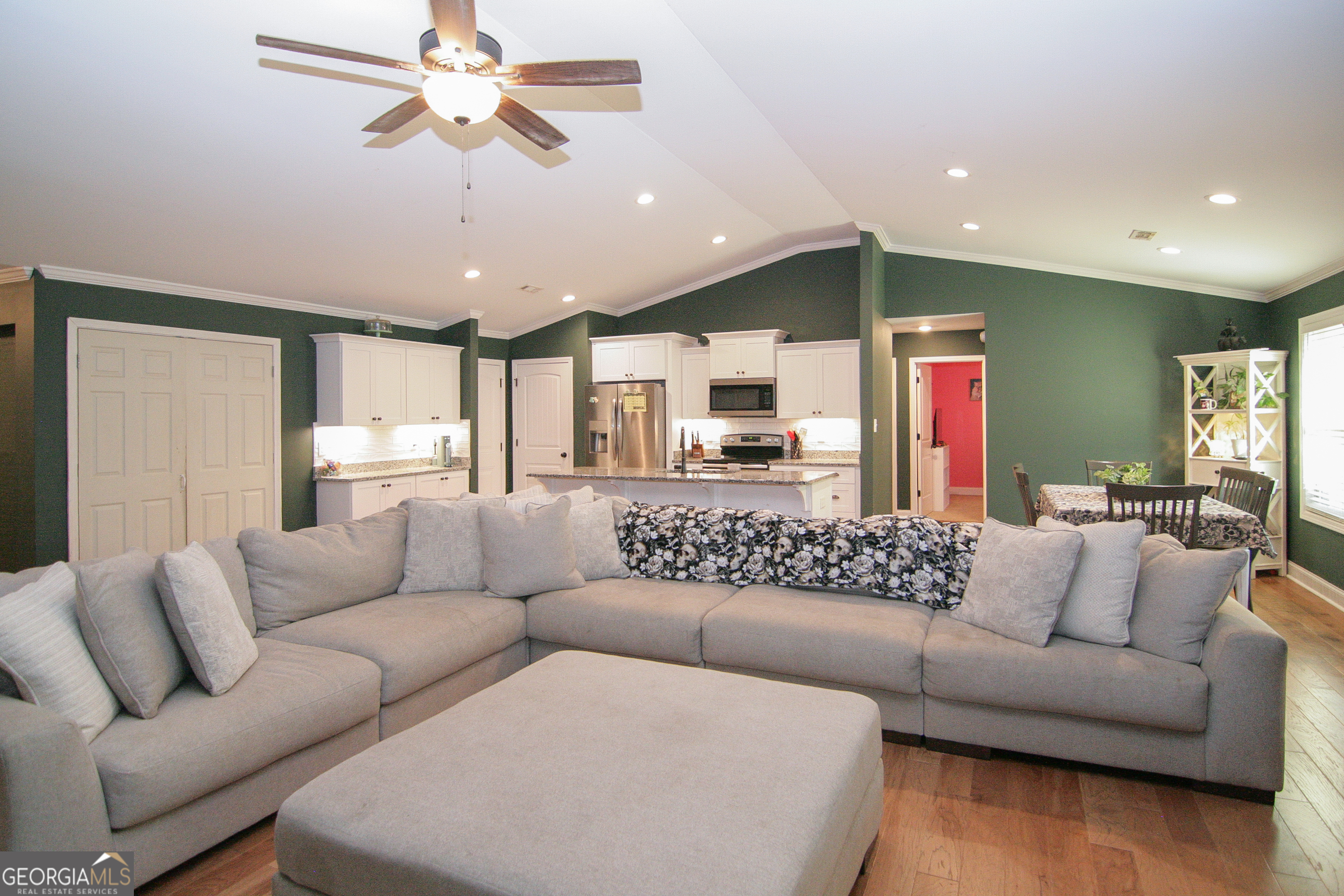 4282 Highway 29 Moreland, GA 30259 - Photo 31 of 60 a living room with furniture kitchen view and a chandelier