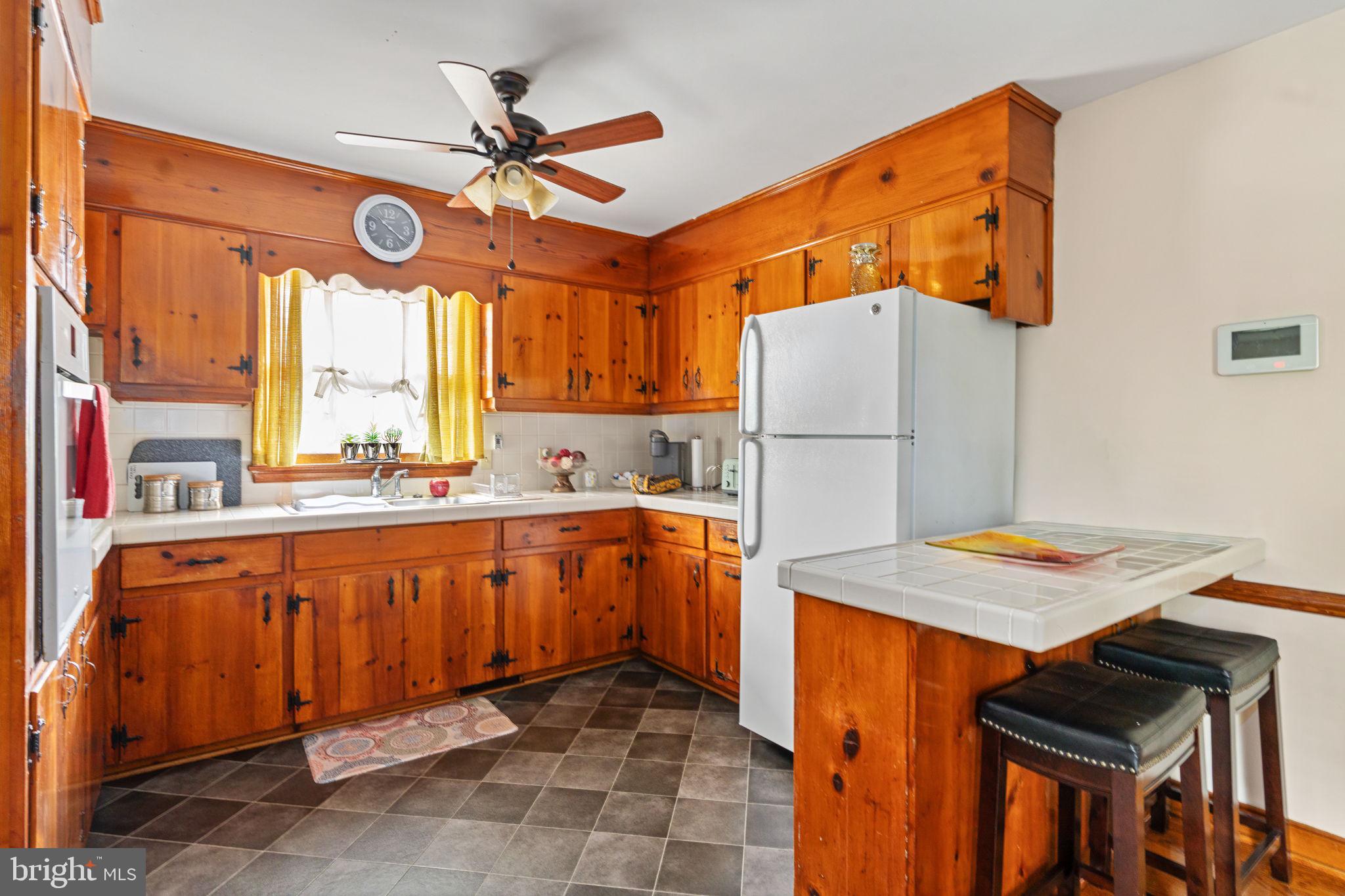 1440 Holly Farm Road Burkeville, VA 23922 - Photo 35 of 52 Warm wooden kitchen with modern charm.