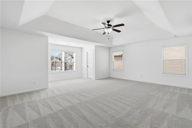 a view of a big room with carpet