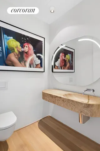 a living room with furniture and large windows