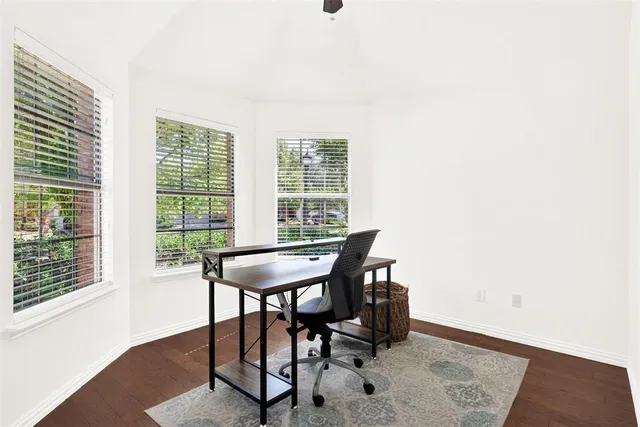 a kitchen with granite countertop a sink and a stove