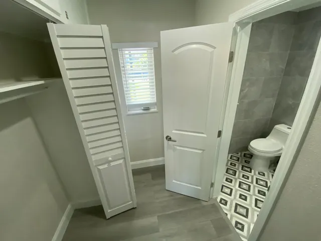 a bathroom with a sink and toilet